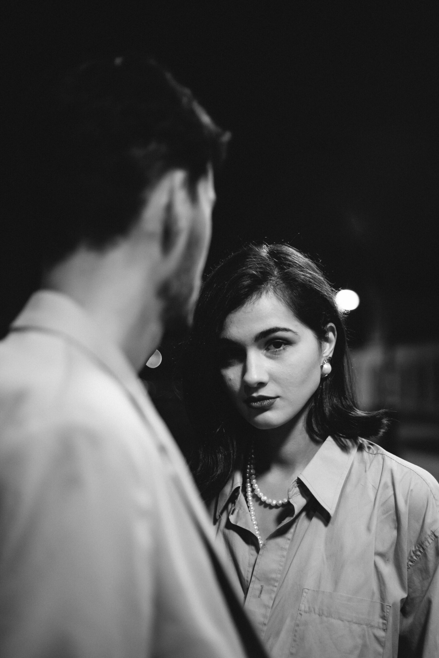 man explaining to woman in a therapy session