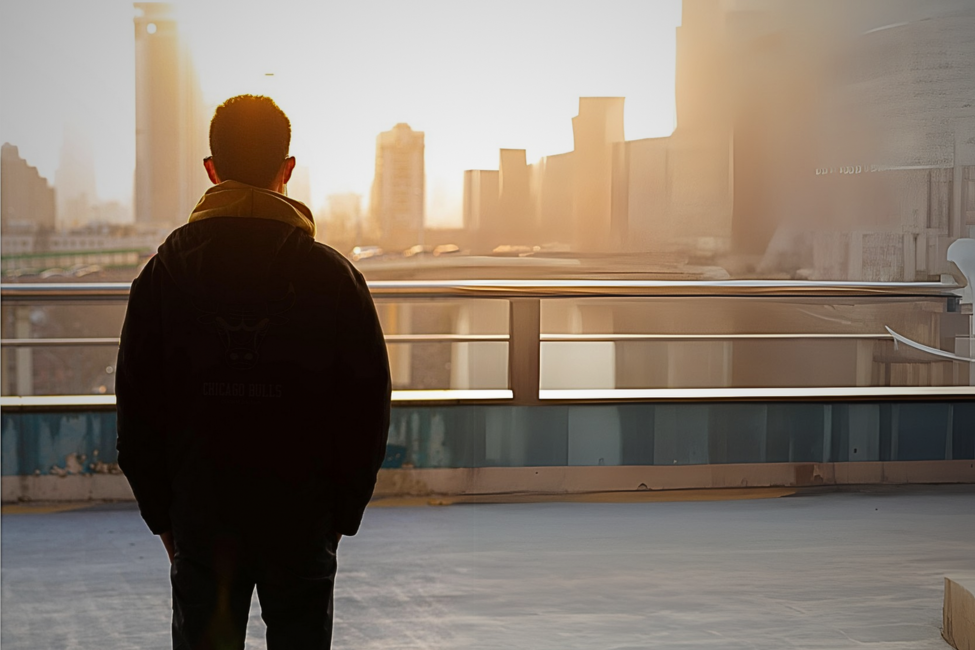 man looking at a roof top - exback